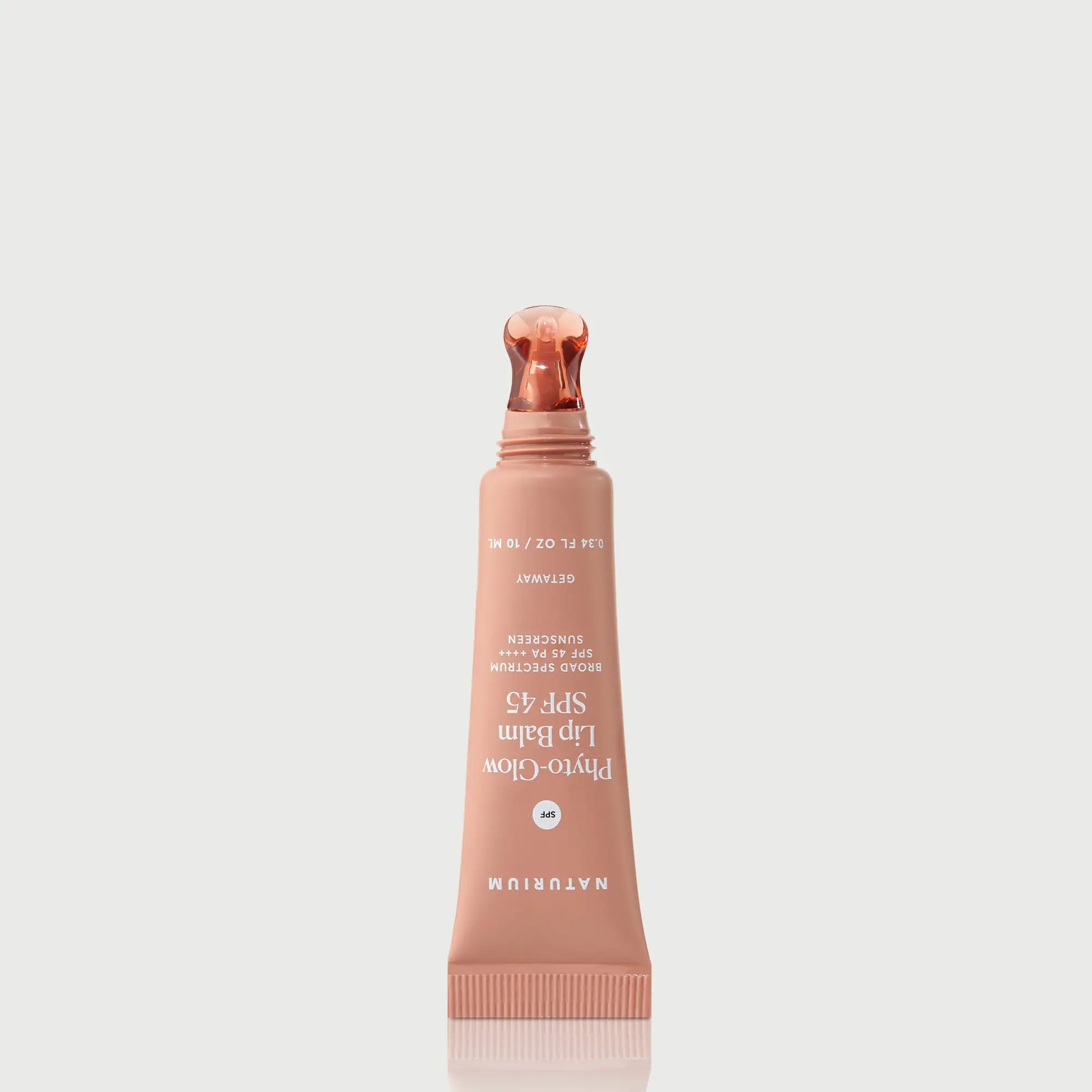 phyto-glow-lip-balm-spf-45-getaway-f7 NATR-10126_PhytoGlow_SPF_Getaway_primary_nocap_bonebkgd_1.webp