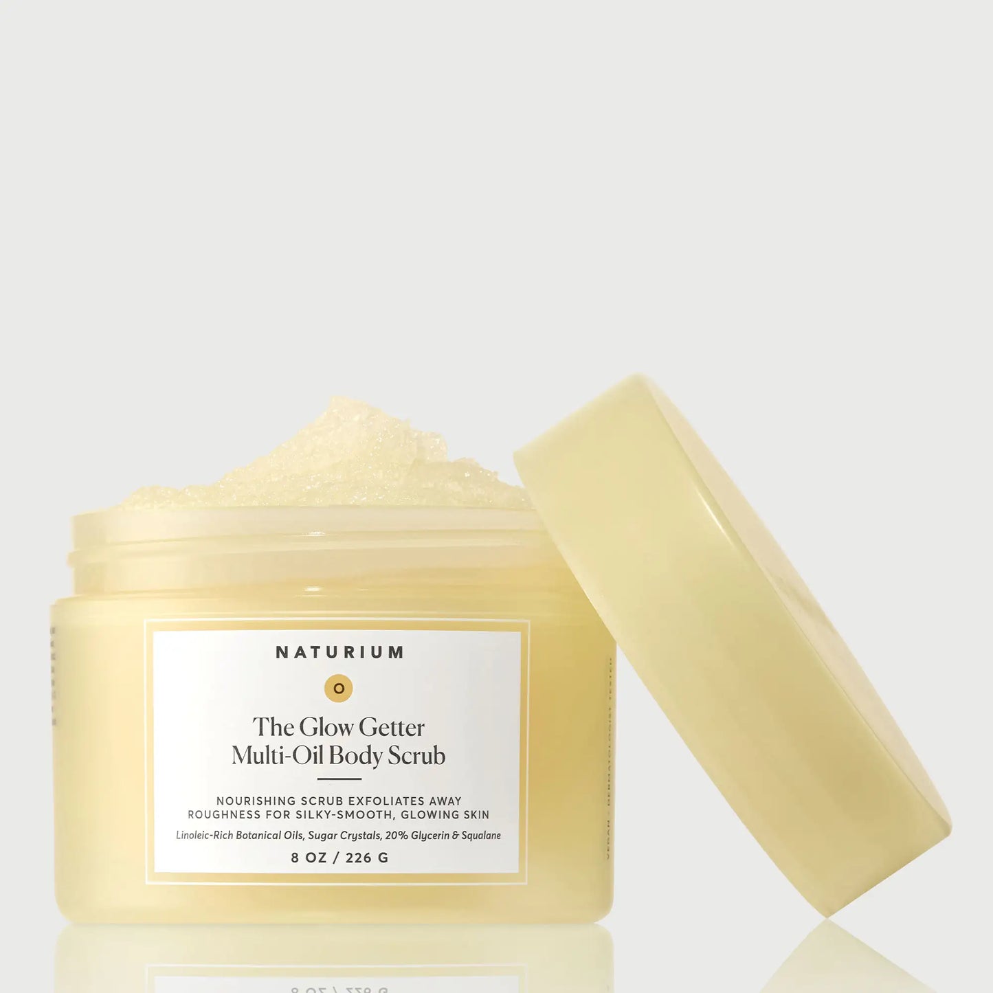 the-glow-getter-multi-oil-body-scrub-o0 NATR-40028-GlowGetter-Multi-Oil-Body-Scrub-Front-CapOff-bonebkgd.webp